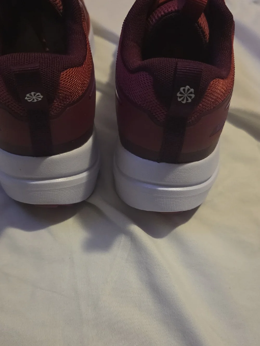 Nike Maroon Running Shoe with Pink Swoosh